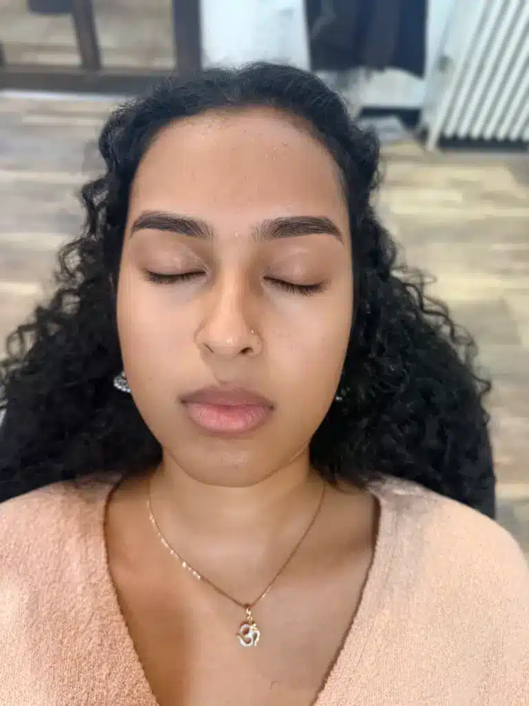 Natural eyebrow threading result with clean symmetrical brows at Brow Lab Somerville.